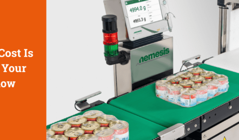 A picture of a checkweigher with cases of cans running on the conveyor: checkweigher downtime